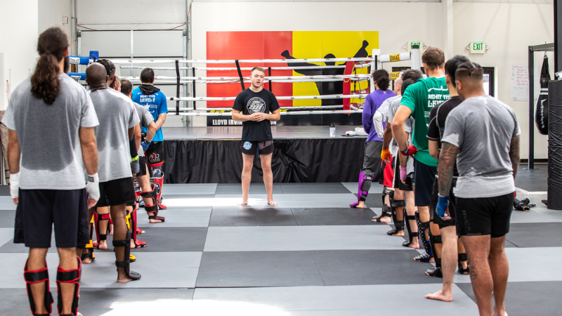 Coach teaching a beginner MMA class at Crazy 88 Elkridge