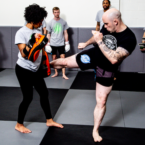 Low Kick Demonstration by Muay Thai Coach