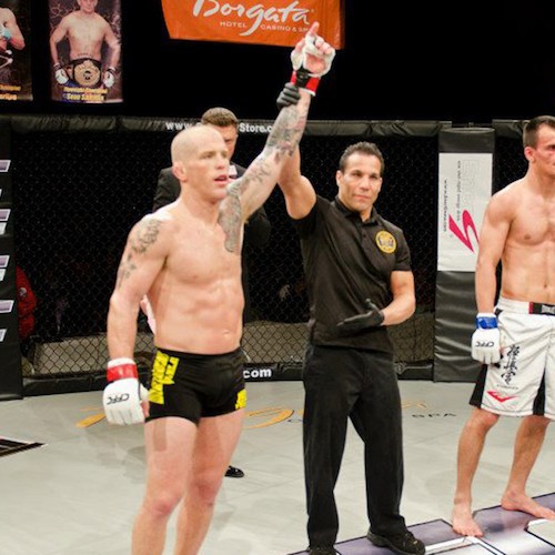 MMA Champion raises arms