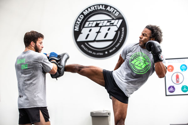 Two men training muay thai