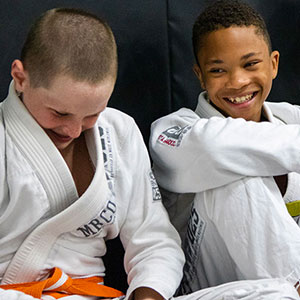 54671096-0-juniors Boys laughing in jiu-jitsu class